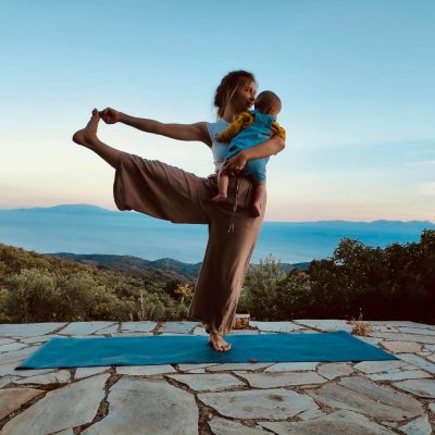 mom with her baby do yoga